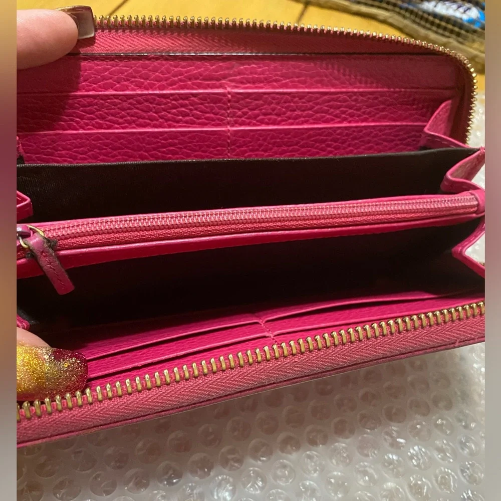 Gucci GG Marmont zip-around wallet in shocking pink